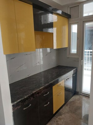 Kitchen in 2 BHK Apartment at Devika Skypers, Raj Nagar Extension – for Sale