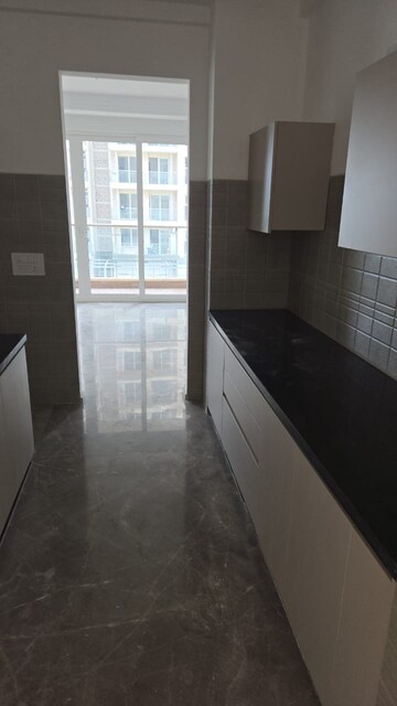 Kitchen in 2 BHK Apartment at Ace Starlit, Sector 152 – for Rent