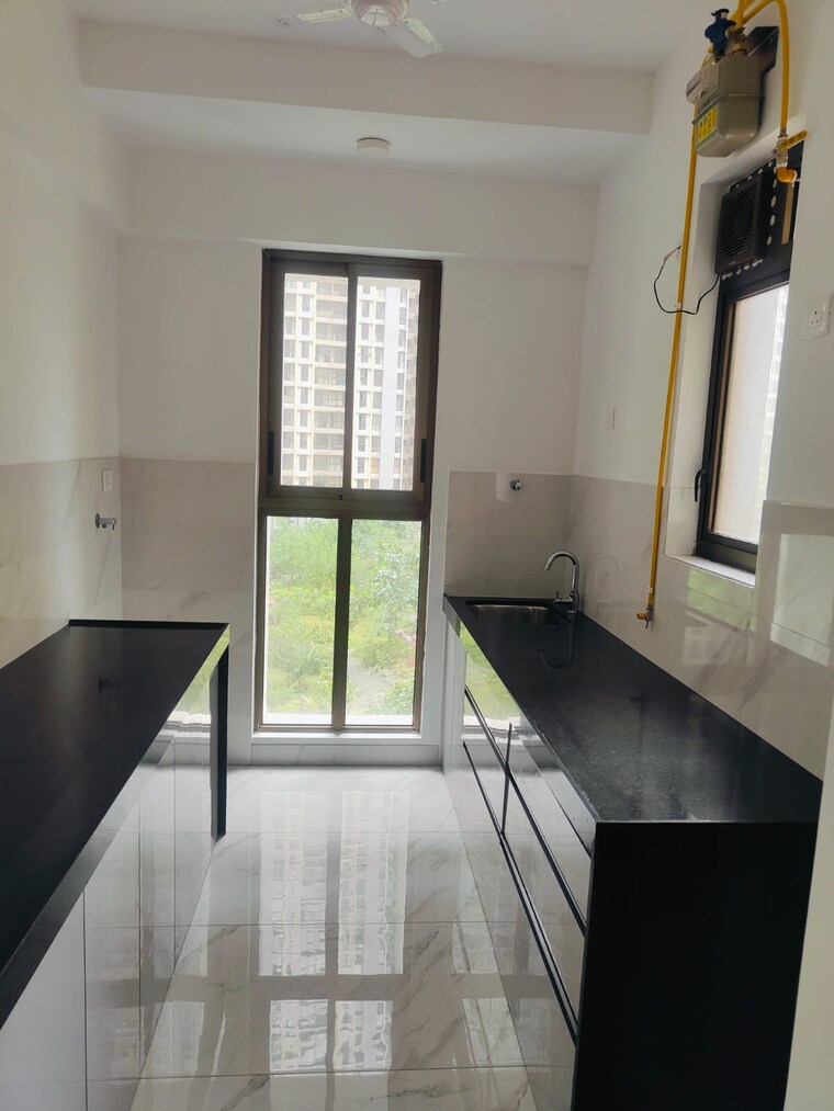Kitchen, raymond-ten-x-vibes 2 Bedroom 680 Sq.Ft. Apartment In J K Gram Thane 9140349
