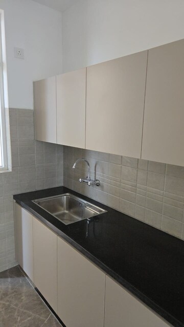 Kitchen in 2 BHK Apartment at Ace Starlit, Sector 152 – for Rent