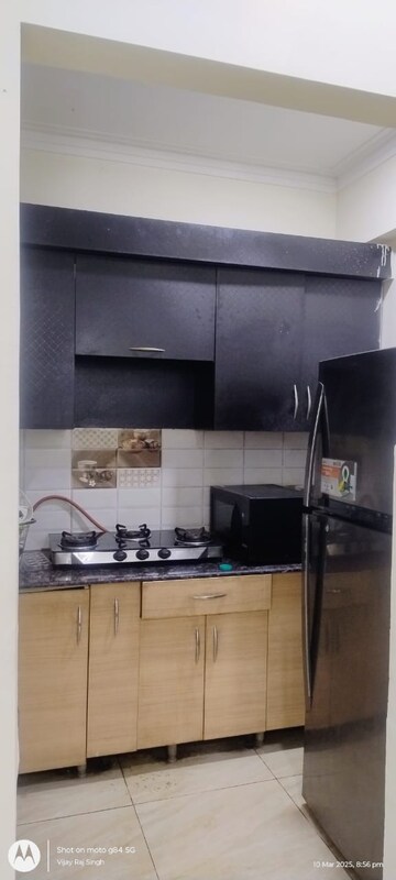 Kitchen in 2.5 BHK Apartment at Mahagun Mywoods, Sector 16c Greater Noida – for Rent