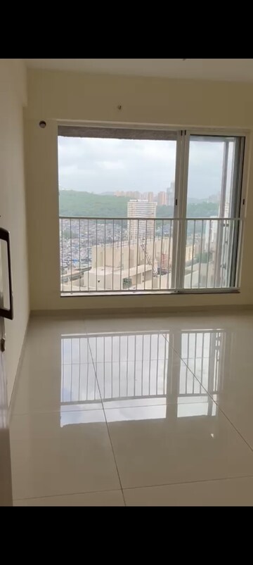 Living Room in 1 BHK Apartment at Godrej Nest Kandivali, Kandivali East – for Rent
