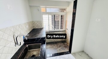 Kitchen in 3 BHK Apartment at Rahul Downtown, Punawale – for Sale