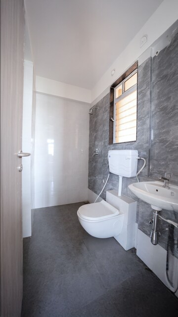 Bathroom in 2 BHK Apartment at Himanshu Astavinayak Vastu Prakalp, Badlapur East – for Sale