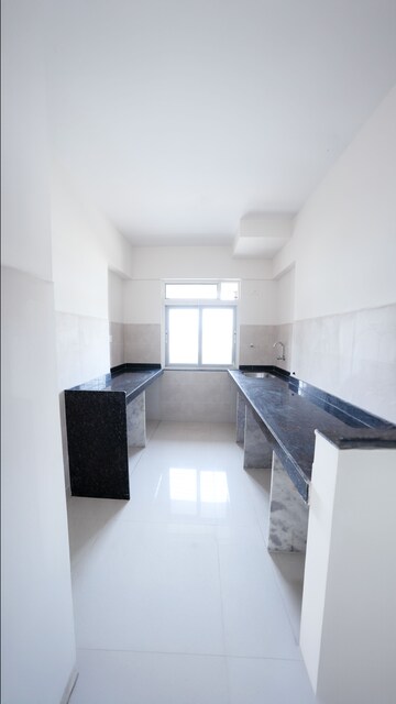Kitchen in 2 BHK Apartment at Himanshu Astavinayak Vastu Prakalp, Badlapur East – for Sale