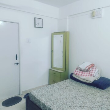 Bedroom in 2 BHK Apartment at Akshay Park, Thergaon – for Sale
