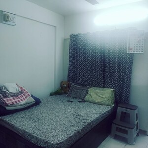 Bedroom in 2 BHK Apartment at Akshay Park, Thergaon – for Sale