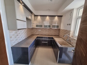 Kitchen in 2 BHK Apartment at Shalimar One World Whispering Woods, Gomti Nagar – for Rent
