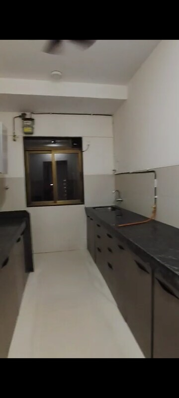 Kitchen in 2 BHK Apartment at Acme Ozone, Manpada – for Rent