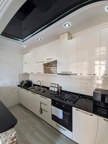 Kitchen in 3 BHK Builder Floor at Surajmal Vihar – for Sale