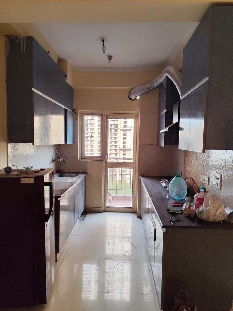 Kitchen, aims-golf-city 2 Bedroom 950 Sq.Ft. Apartment In Sector 75 Noida 9141343