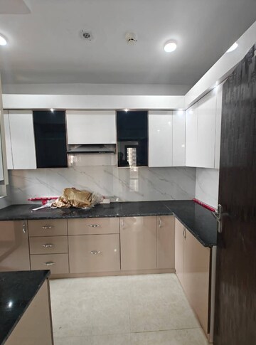 Kitchen in 3 BHK Apartment at RG Luxury Homes, Sector 16b Greater Noida – for Rent