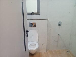 Bathroom in 3 BHK Apartment at Raja Park – for Sale