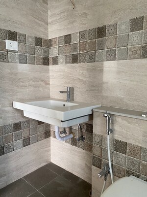 Bathroom in 2 BHK Apartment at Merlin Elita Garden Vista Phase 2, New Town – for Sale