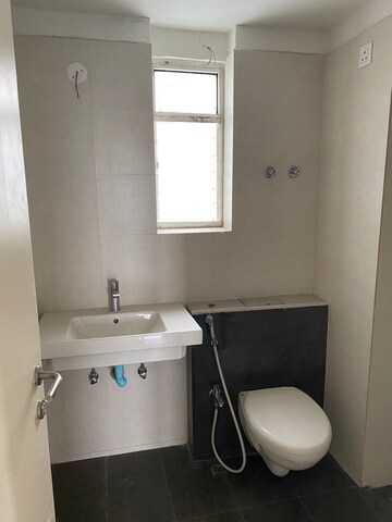 Bathroom in 2 BHK Apartment at Merlin Elita Garden Vista Phase 2, New Town – for Sale