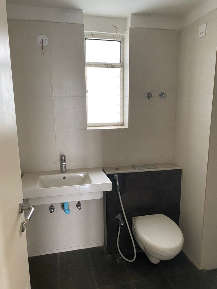 Bathroom, merlin-elita-garden-vista-phase-2 2 Bedroom 1209 Sq.Ft. Apartment In New Town Kolkata 9141527