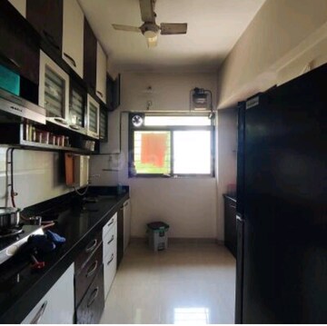 Kitchen in 2 BHK Apartment at Prestige Residency Gardenia, Ghodbunder Road – for Rent