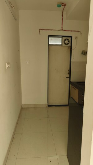 Kitchen in 1 BHK Apartment at Ashar Metro Towers, Vartak Nagar – for Sale