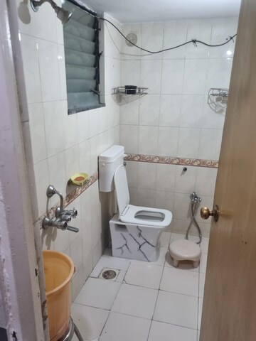 Bathroom in 2 BHK Apartment at Taware Colony – for Sale
