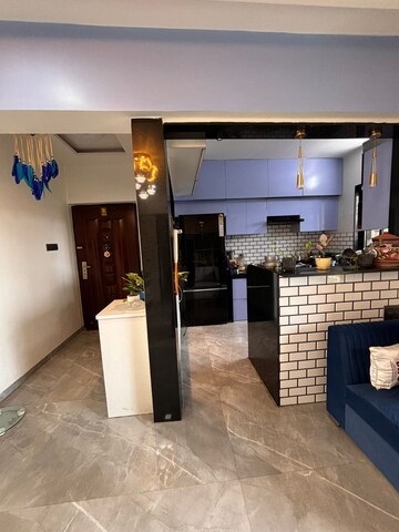 Living Room in 2 BHK Apartment at Swastik Regalia, Waghbil – for Rent