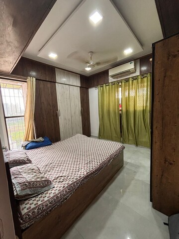 Bedroom in 2 BHK Apartment at Swastik Regalia, Waghbil – for Rent