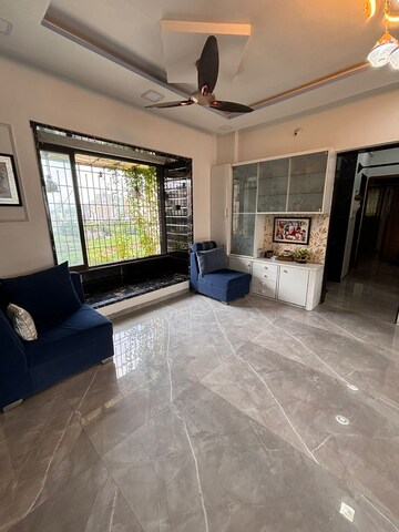 Living Room in 2 BHK Apartment at Swastik Regalia, Waghbil – for Rent