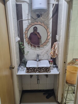 Bathroom in 2 BHK Apartment at Taware Colony – for Sale