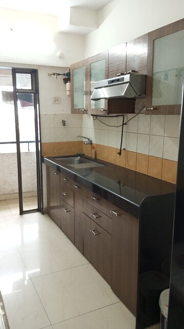 Kitchen in 2 BHK Apartment at Nirlac Solitaire Tower, Manpada – for Sale
