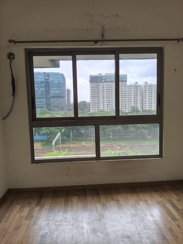 Bedroom in 2 BHK Apartment at Triumph Omkareshwar CHS, Borivali East – for Rent