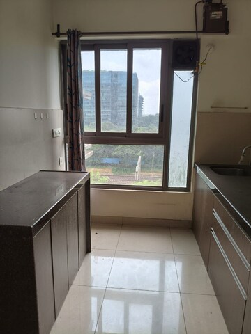 Kitchen in 2 BHK Apartment at Triumph Omkareshwar CHS, Borivali East – for Rent