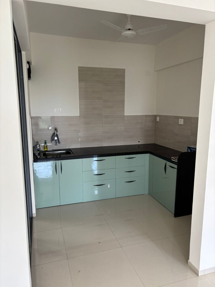 Kitchen, saarrthi-skybay 2 Bedroom 1008 Sq.Ft. Apartment In Mahalunge Pune 9142128