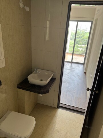 Bathroom in 2 BHK Apartment at Saarrthi Skybay, Mahalunge – for Rent