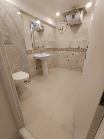 Bathroom in 4 BHK Apartment at Exotica East Square, Nyay Khand – for Sale