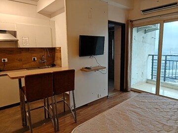 Team Area in 1 BHK Apartment at Nimbus The Golden Palm, Sector 168 – for Rent