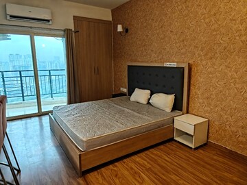 Bedroom in 1 BHK Apartment at Nimbus The Golden Palm, Sector 168 – for Rent