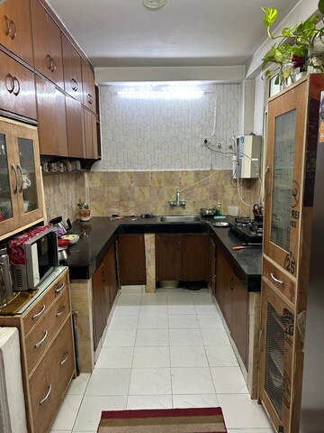 Kitchen in 3 BHK Apartment at Prabhu Apartments, Sector 21d – for Sale