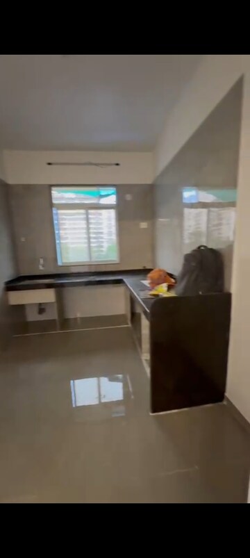 Kitchen in 2 BHK Apartment at Vastu Aroma Heights, Dombivli East – for Sale
