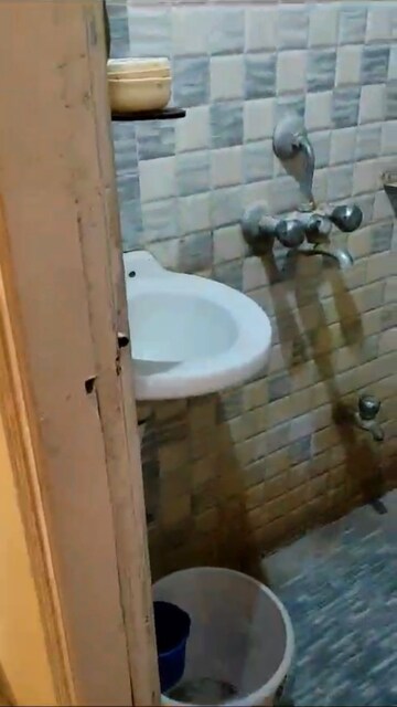 Bathroom in 2 BHK Apartment at Rajarhat Road – for Rent