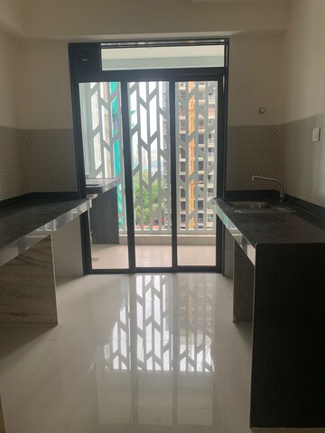 Kitchen in 2 BHK Apartment at Wadhwa TW Gardens, Kandivali East – for Rent