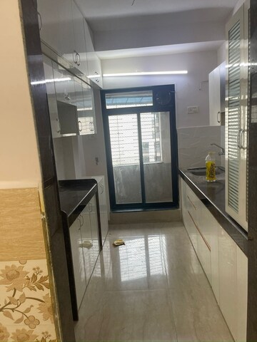 Kitchen in 2 BHK Apartment at RNA NG Paradise, Mira Road – for Rent