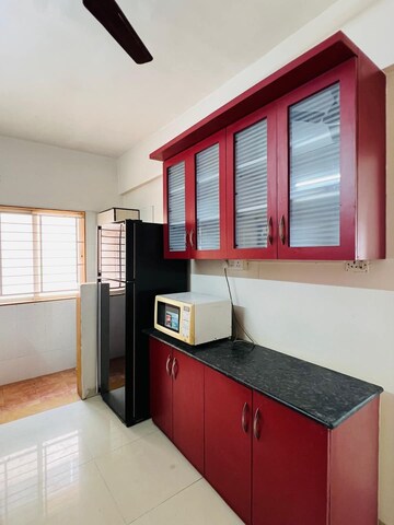 Kitchen in 2 BHK Apartment at Eastwoods, Nibm – for Rent