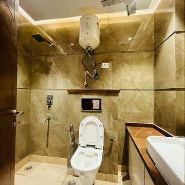 Bathroom in 4 BHK Builder Floor at Chattarpur – for Rent