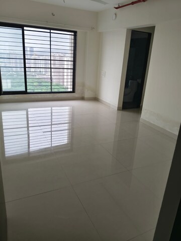 Room in 2 BHK Apartment at Acme Oasis, Kandivali East – for Rent