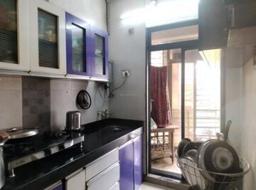 Kitchen in 1 BHK Apartment at Elite Homes, Kharghar Sector 35e – for Sale