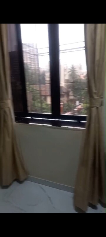 Balcony in 1 BHK Apartment at Jasdanwala Building, Bhuleshwar – for Rent