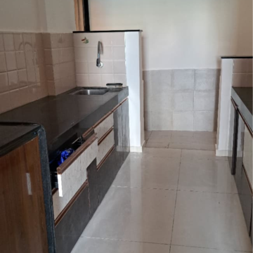 Kitchen in 2 BHK Apartment at Atul Western Hills Phase 2, Link Road – for Rent