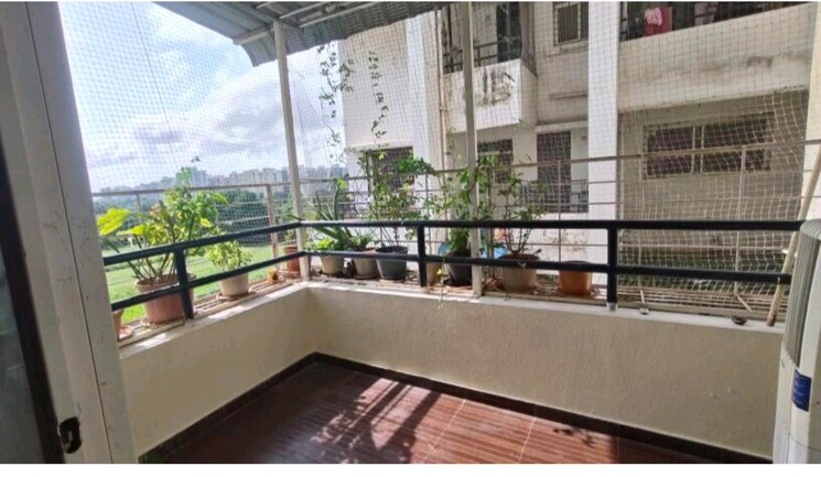 Balcony, silver-silver-9 1 Bedroom 485 Sq.Ft. Apartment In Moshi Pune 9142803
