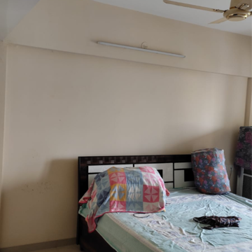 Bedroom in 2 BHK Apartment at Yashwin Jeevan and Orchid, Mahalunge – for Rent