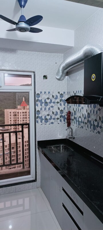 Kitchen in 1 BHK Apartment at Raunak Bliss, Ghodbunder Road – for Rent