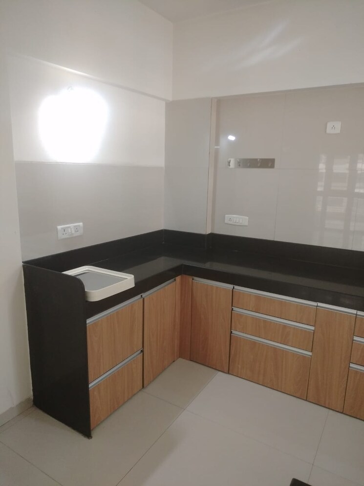 Kitchen, vasudha-sai-eshanya 2 Bedroom 1350 Sq.Ft. Apartment In Balewadi Pune 9143178